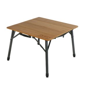 A low camping table with wooden top